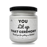 a white jar with a black lid that says you lift up that ceremony