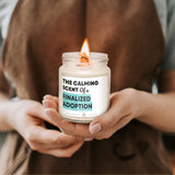 a person holding a candle in their hands