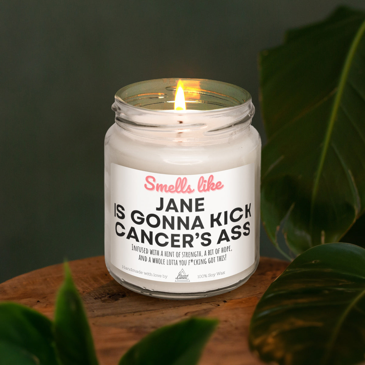 a candle sitting on top of a wooden table