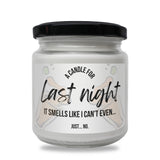a jar of candle that says last night it smells like i can't even