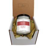 a candle in a box that says flickk?