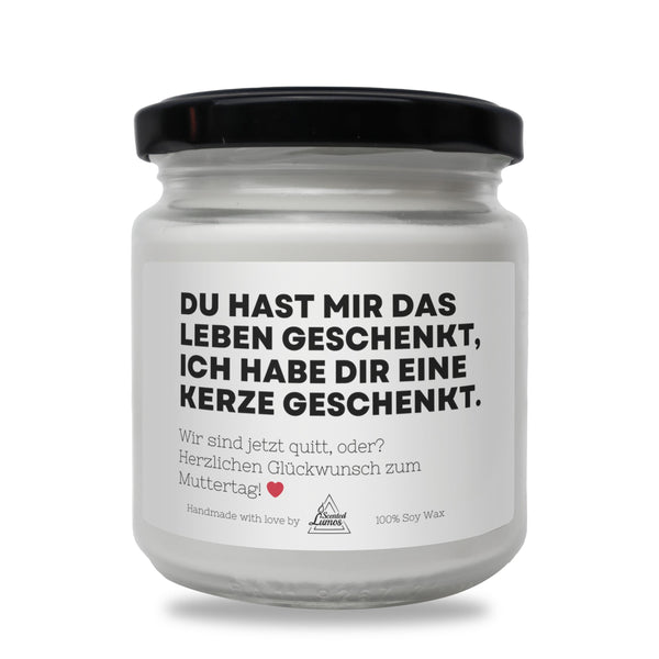 a white jar with a black lid on a white background