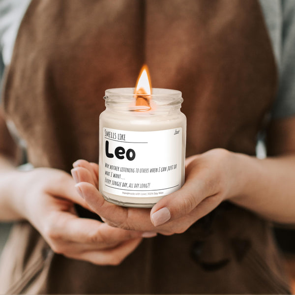 a person holding a candle in their hands