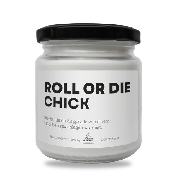 a white jar with a black lid that says roll or die chick