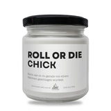 a white jar with a black lid that says roll or die chick