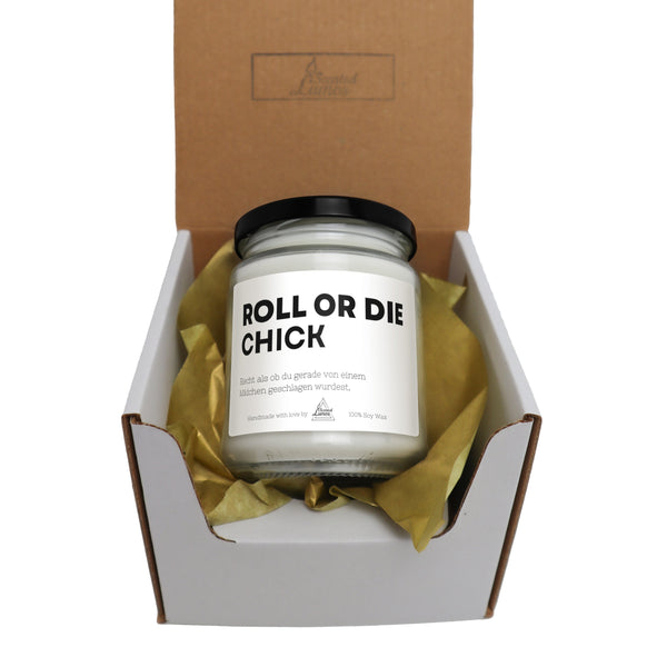 a box with a candle inside of it