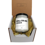 a box with a candle inside of it