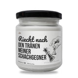 a jar of white paint with a black lid