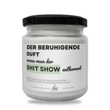 a jar of white stuff on a white background