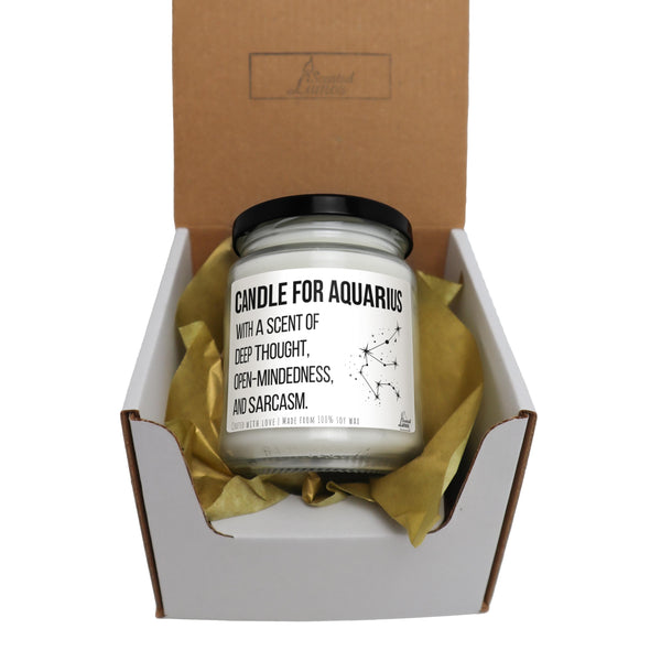 a candle for aquarius in a gift box