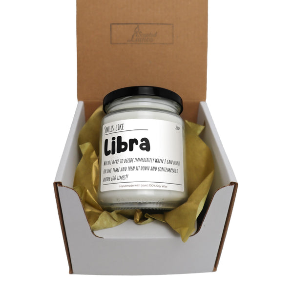 a jar of liquid sitting inside of a box