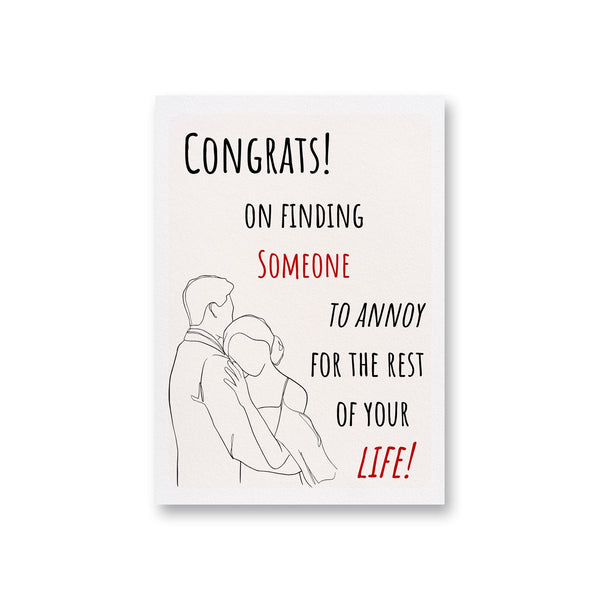 a card with a drawing of a man hugging a woman