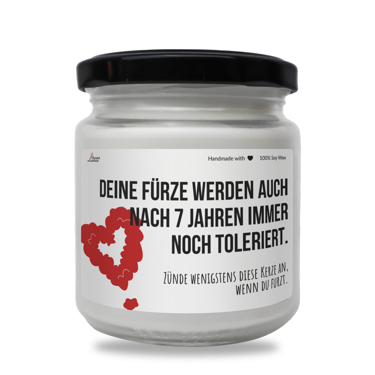 a white jar with a red heart on it