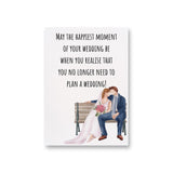 a wedding card with a picture of a bride and groom sitting on a bench