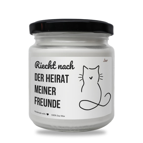 a white jar with a black lid and a cat on it