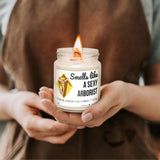 a woman holding a candle in her hands