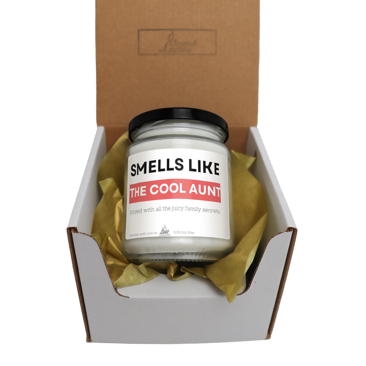 a candle in a box that says smells like the cool adult