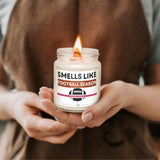 a person holding a candle in their hands