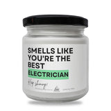 a white jar with a black lid that says smells like you're the best