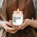 a person holding a candle in their hands