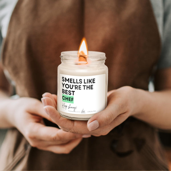 a person holding a candle in their hands