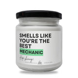 a white jar with a black lid that says smells like you're the best