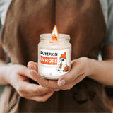 a person holding a jar of pumpkin whole whipped cream