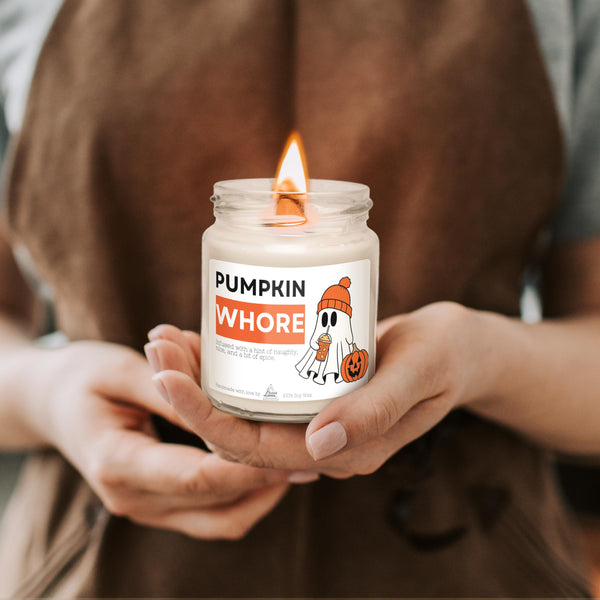 a person holding a jar of pumpkin whole whipped cream