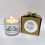 a candle that is next to a box