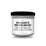 a white candle with a black lid that says, with a scent of high -