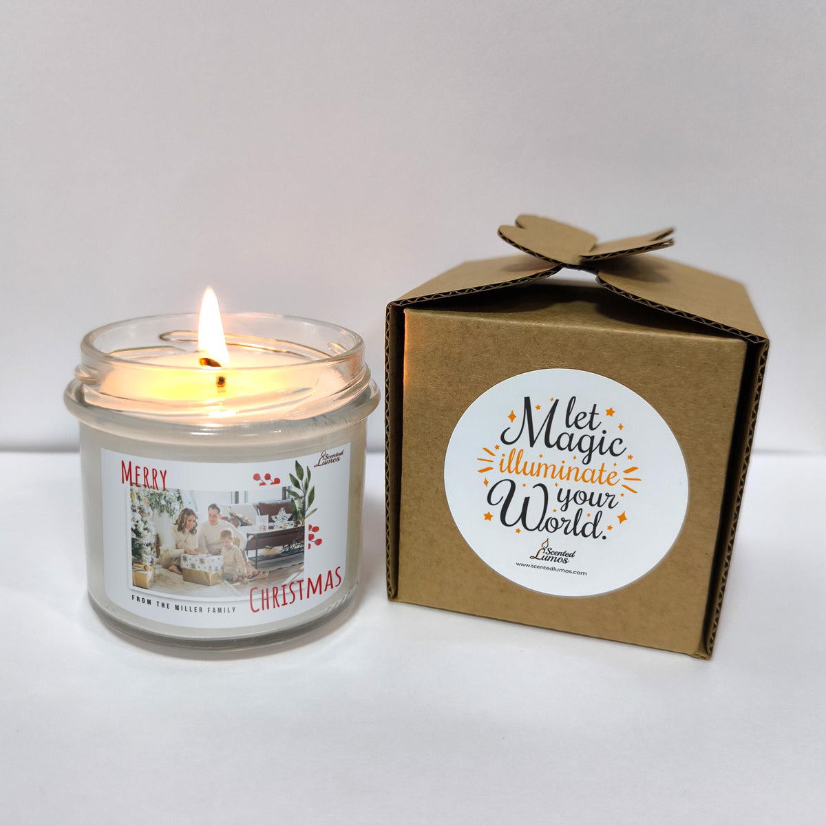 a lit candle sitting next to a box