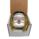 a jar of smells like football season sits in a box