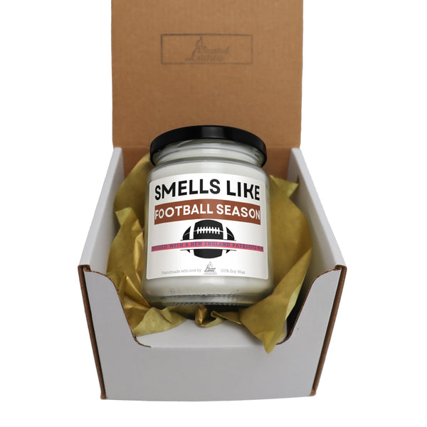 a jar of smells like football season sits in a box