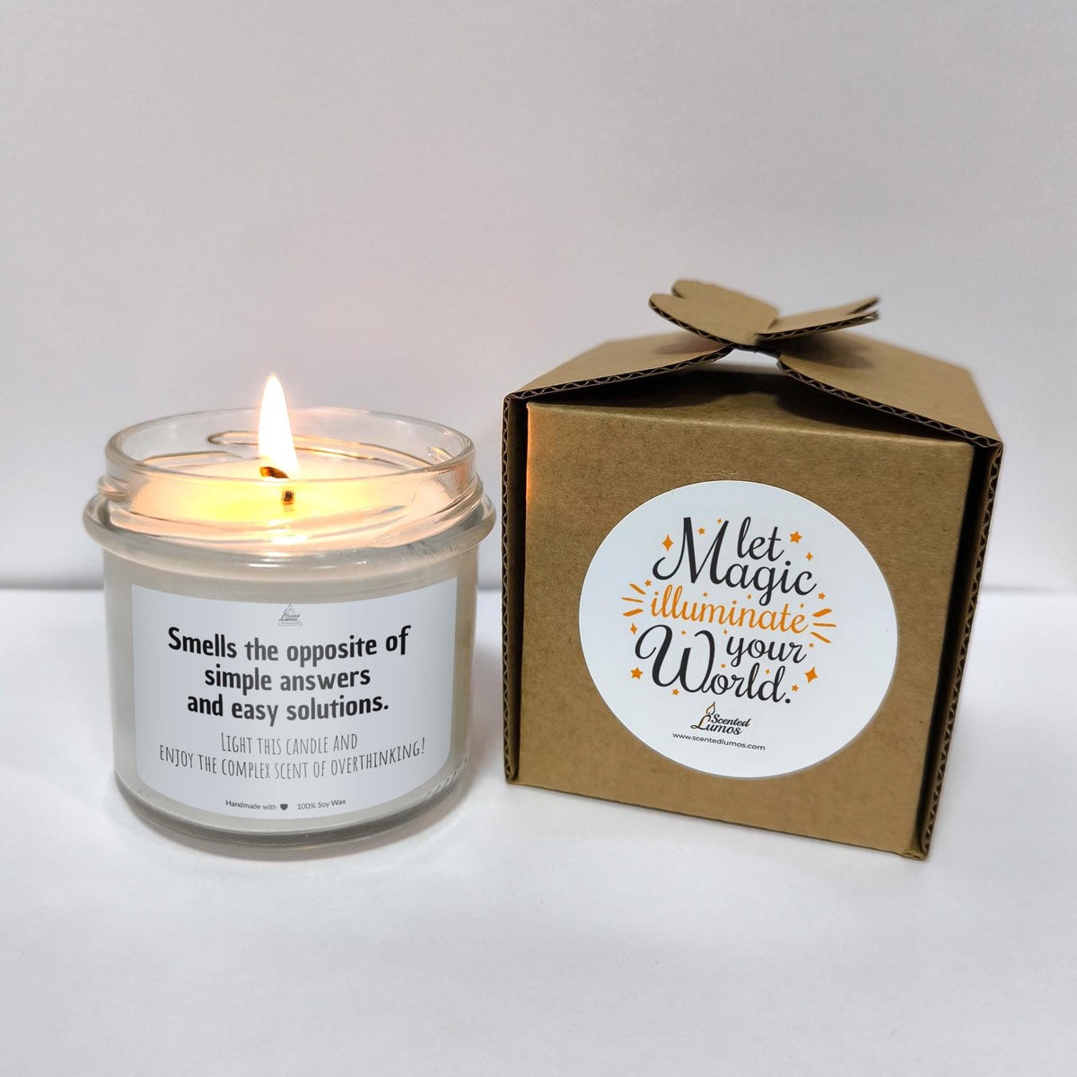 a candle that is next to a box