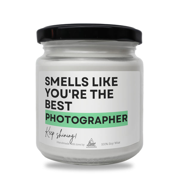 a white jar with a black lid that says smells like you&#39;re the best