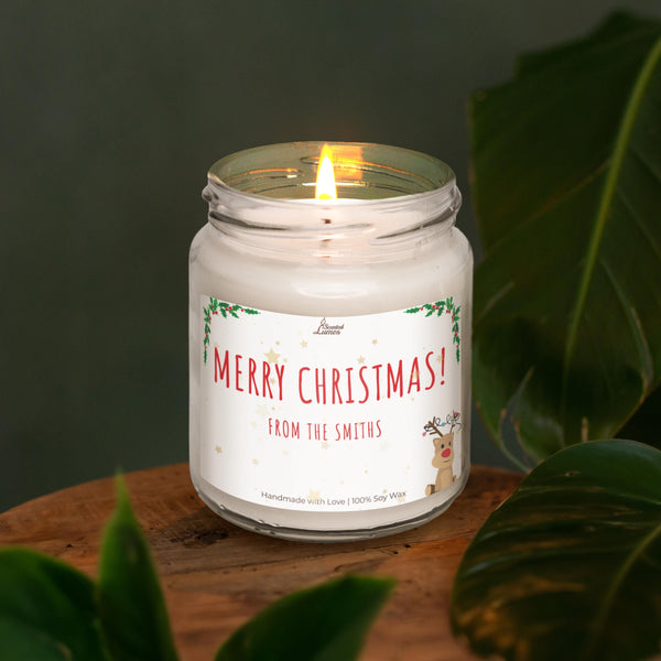 a white candle sitting on top of a wooden table