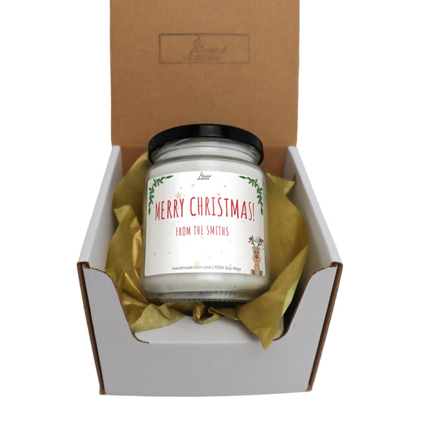 a christmas candle in a gift box