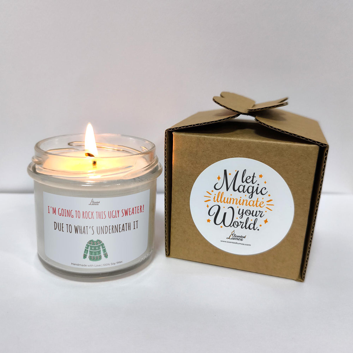 a candle that is sitting next to a box