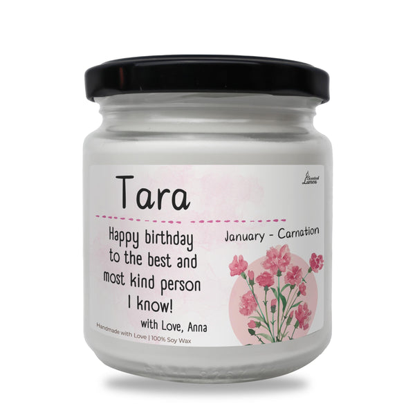 a jar of birthday candles with pink flowers