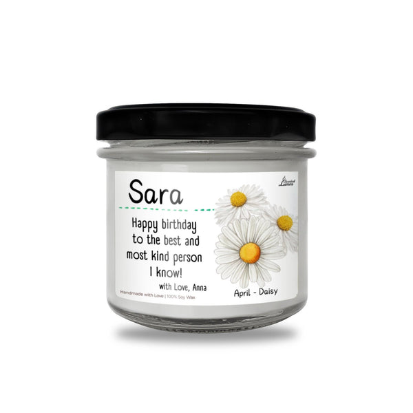 a jar of birthday candles with daisies on it
