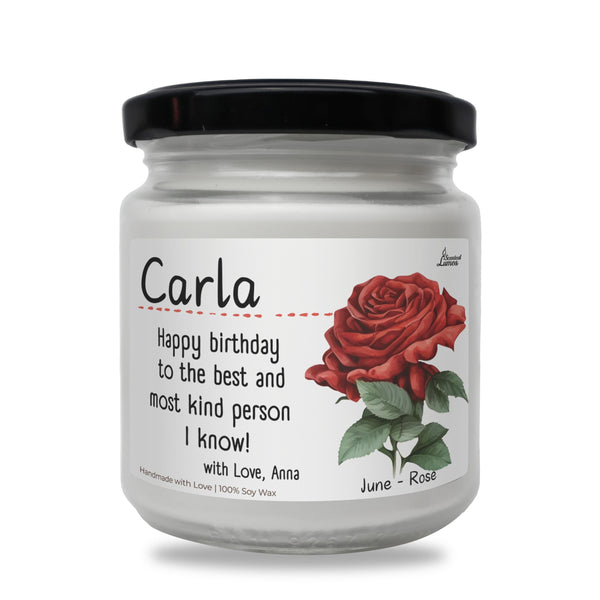 a jar of candles with a red rose on it