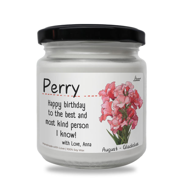 a jar of birthday candles with pink flowers