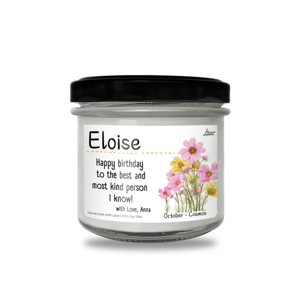 a jar of birthday candles with pink flowers