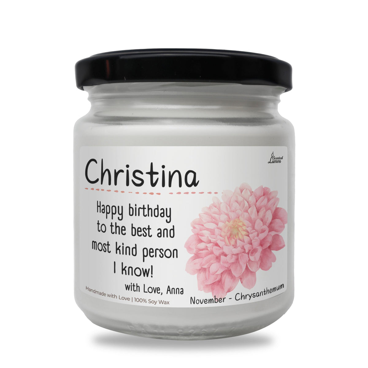a white jar with a pink flower on it