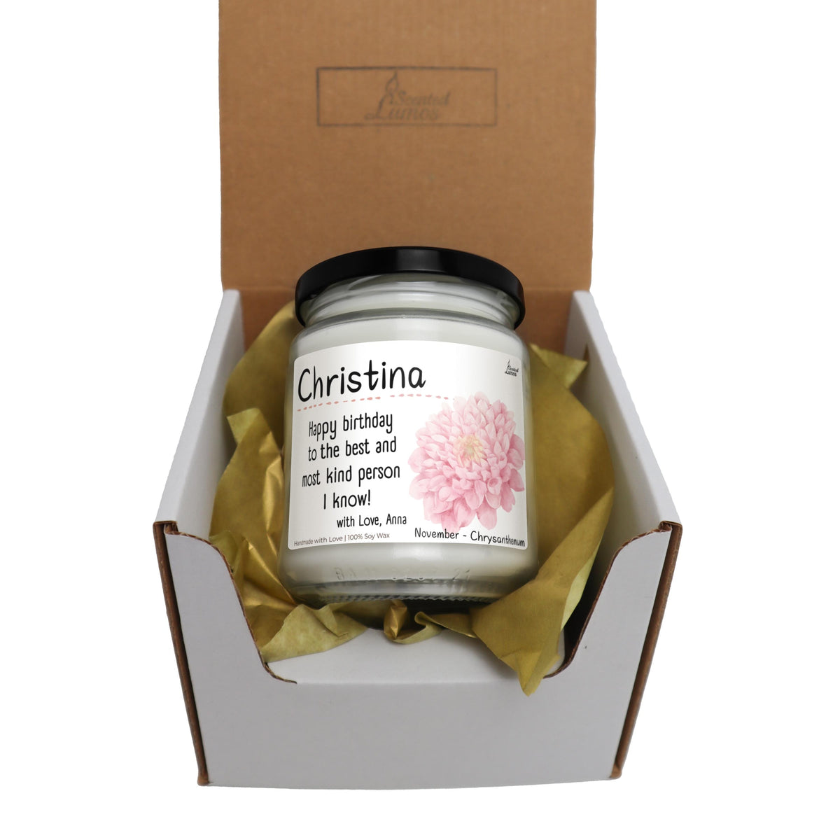 a white box with a pink flower inside of it