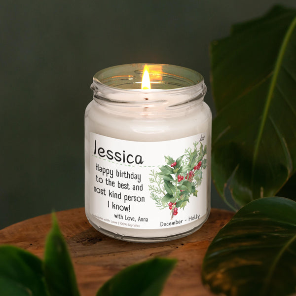 a white candle sitting on top of a wooden table