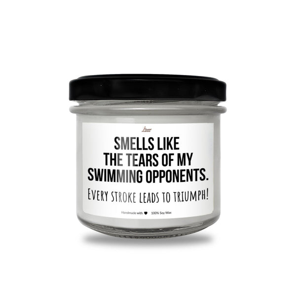 a white jar with a black lid that says smells like the tears of my swimming