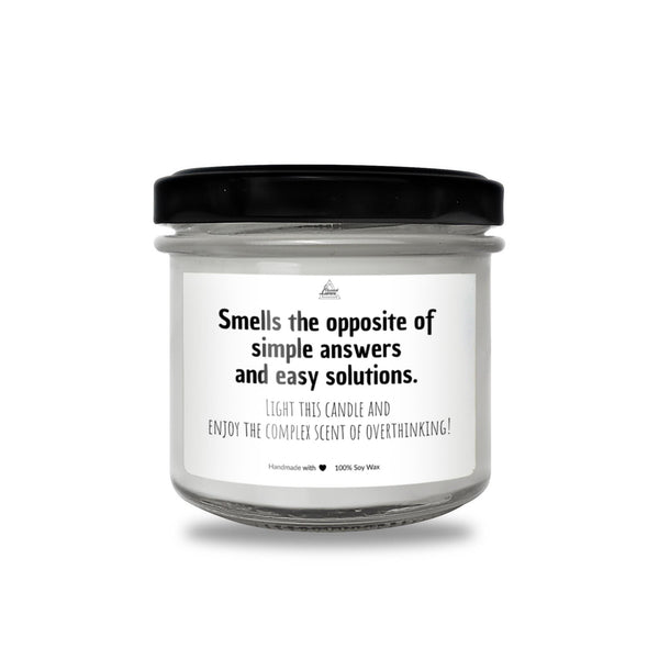 a jar of white candles with a black lid