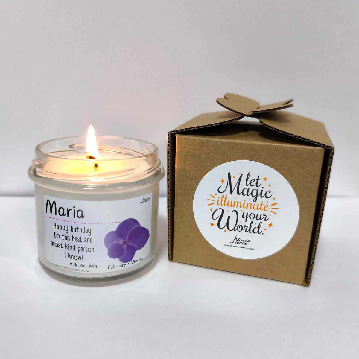 a candle that is next to a box