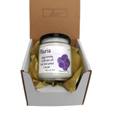 a jar of marjo sitting inside of a box